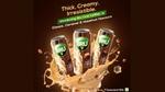 An advert for Bru Cold Coffee showing 3 packs of the product