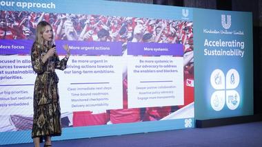 Rebecca Marmot presenting at HUL's 2024 'Accelerating Sustainability' event.