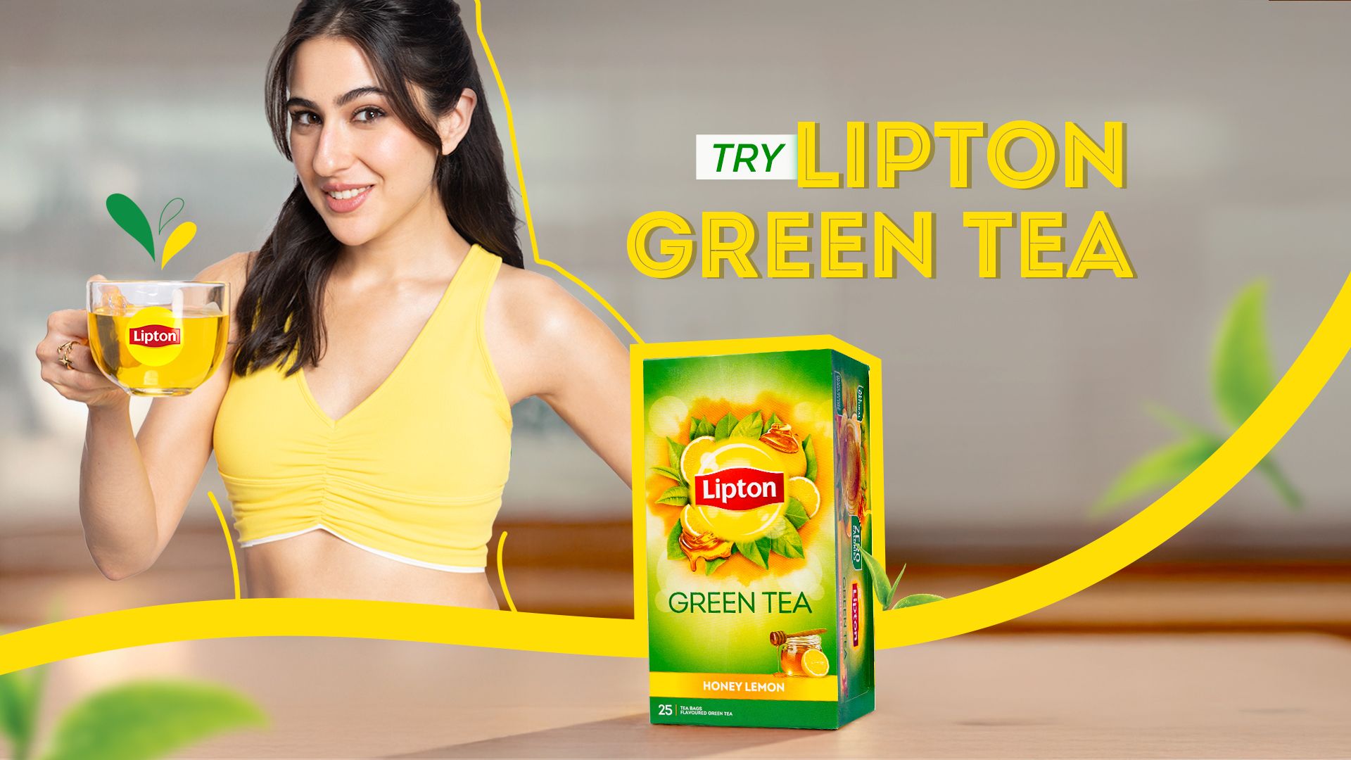 Woman holding a cup of Lipton Green Tea
