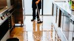 A man cleaning the floor