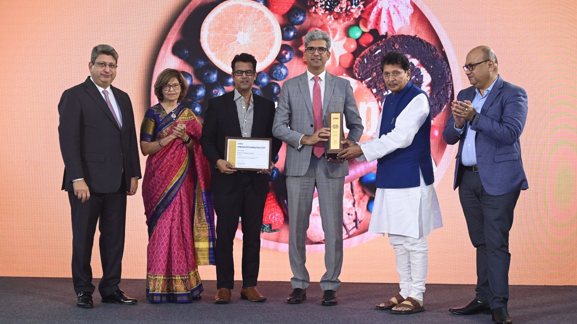 Image of 6 people at an awards ceremony
