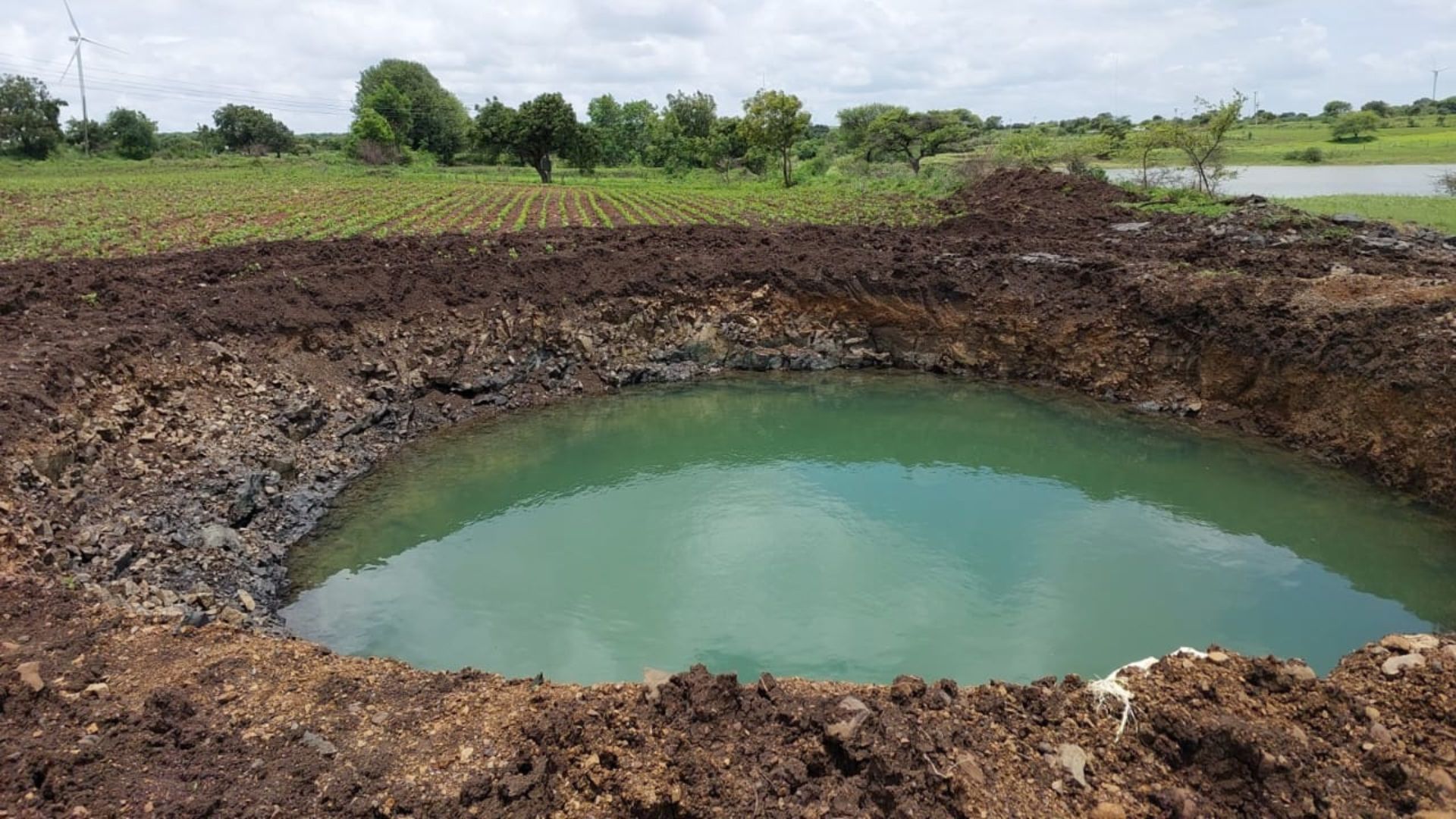 Image of a farm pond in Osmanabad, Maharashtra built though the intervention of Hindustan Unilever Foundation