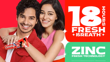 Two people with a Closeup product.