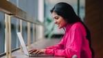 A woman working at her computer