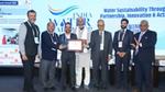 A group of 7 people with the ASSOCHAM National Water award and certificate.