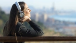 Image of a lady listening music