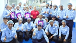 Factory workers together with Sharmishtha Biswas