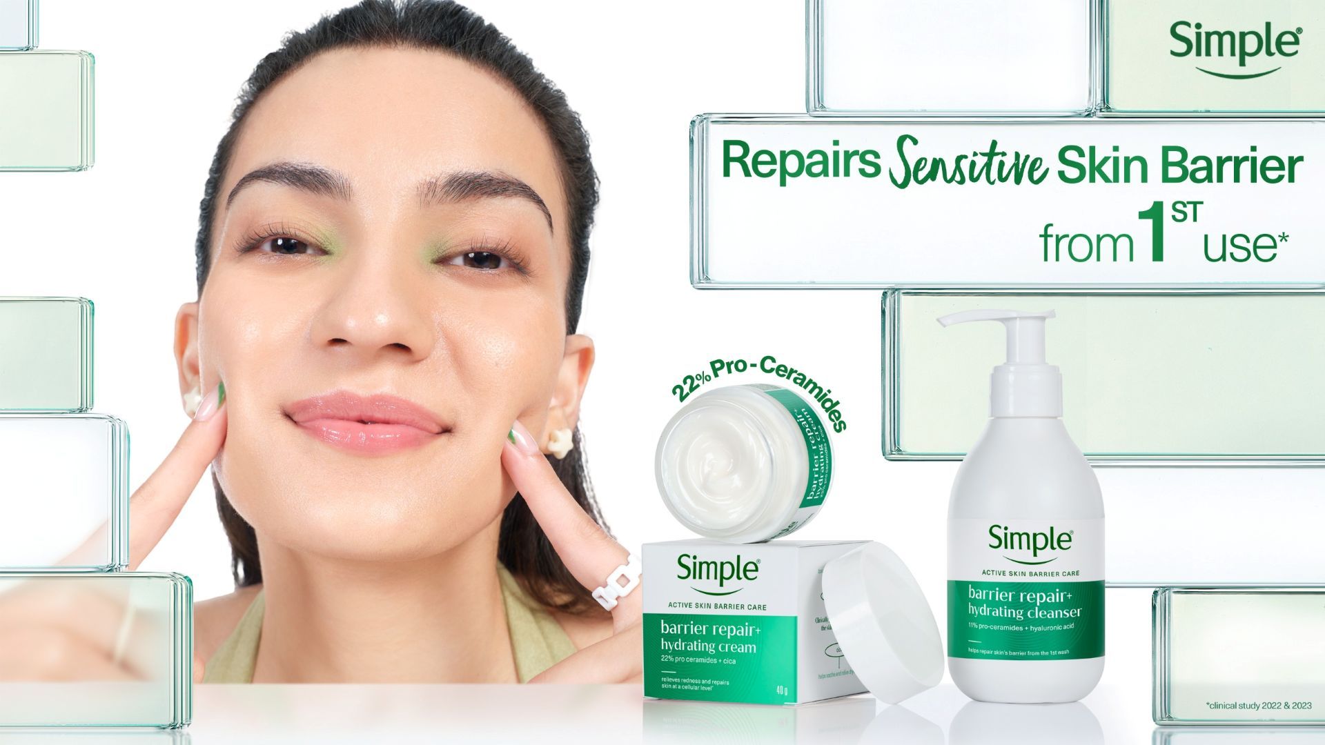 Woman applies Simple barrier repair cream beside a bottle of hydrating cleanser.