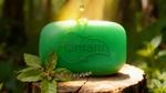 A green soap with Hamam logo on a wood
