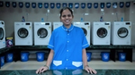 A lady worker managing the laundromat section at HUL’s Suvidha centre