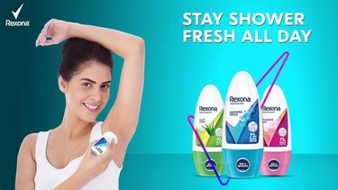 Rexona brand banner with image text, stay shower fresh all day. The image has a model using a Rexona deo.