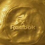 Dove and Reebok logos on a golden background.