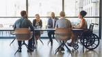Image of a group of collaborators having a meeting
