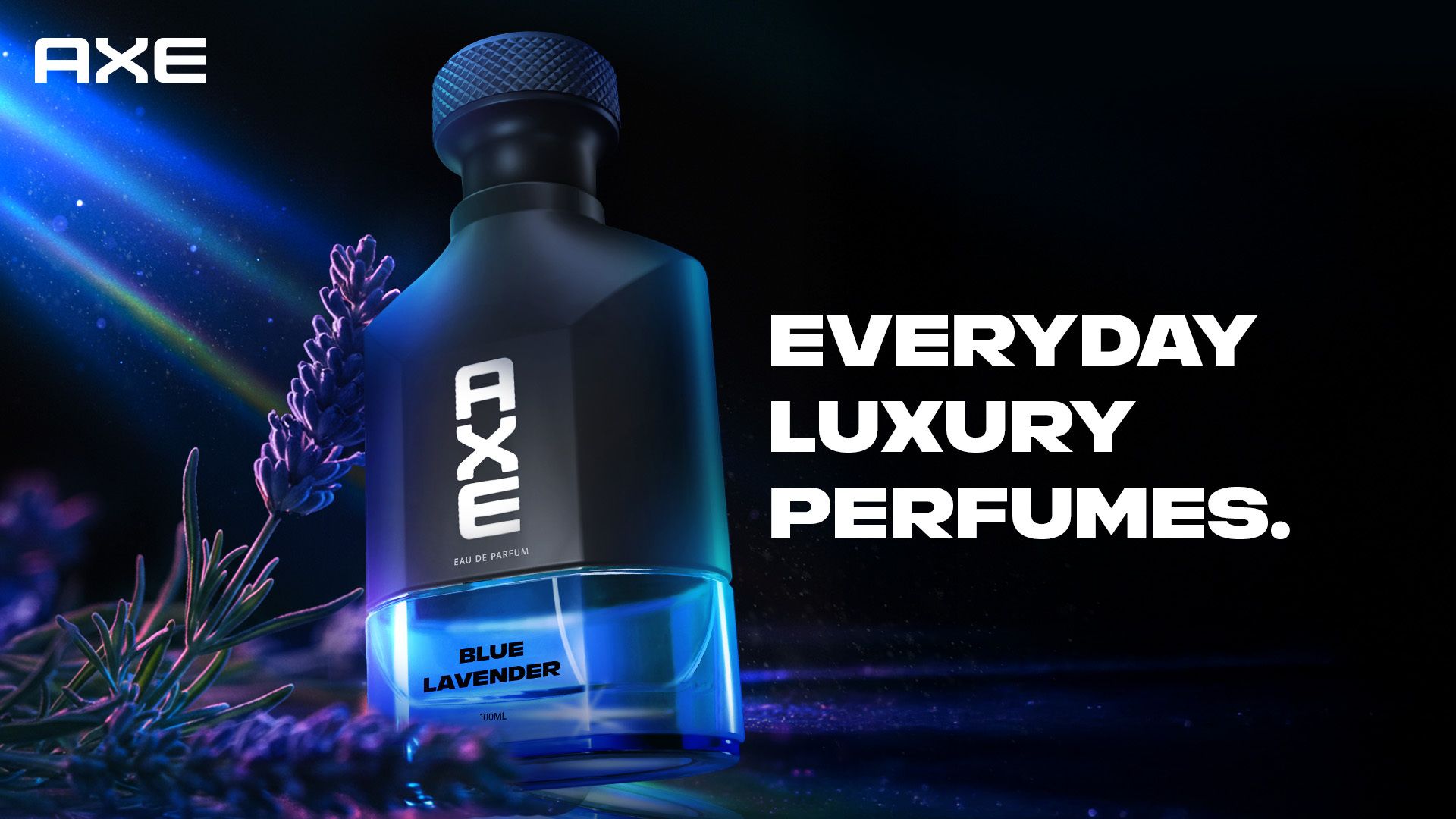 Perfume bottle labeled "Axe Blue Lavender" with sprigs of lavender. Text reads "Everyday Luxury Perfumes" on a dark, atmospheric background.