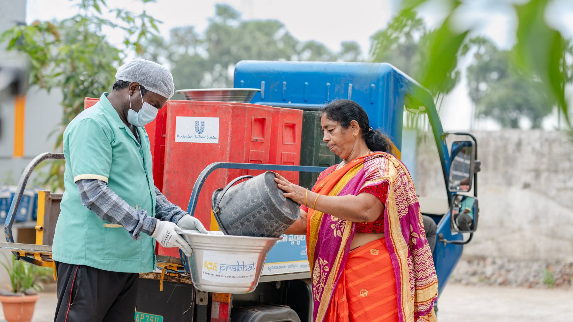 A waste worker segregating waste at Prabhat community waste management centre.