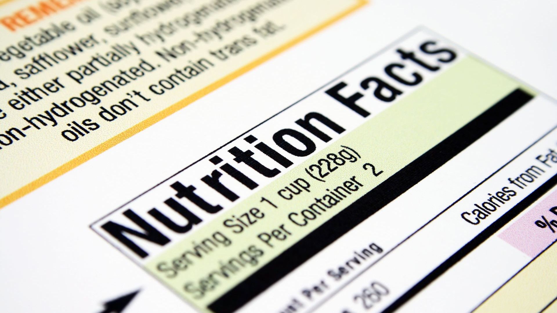 Close-up of a ‘Nutrition Facts’ label on packaged food – which shows a serving size of 1 cup (228g) and indicates 2 servings per container.