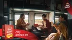 Three people smiling and drinking tea on a train, with a Red Label tea box and a slogan.