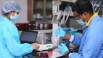 Two HUL Unilever employees in a lab