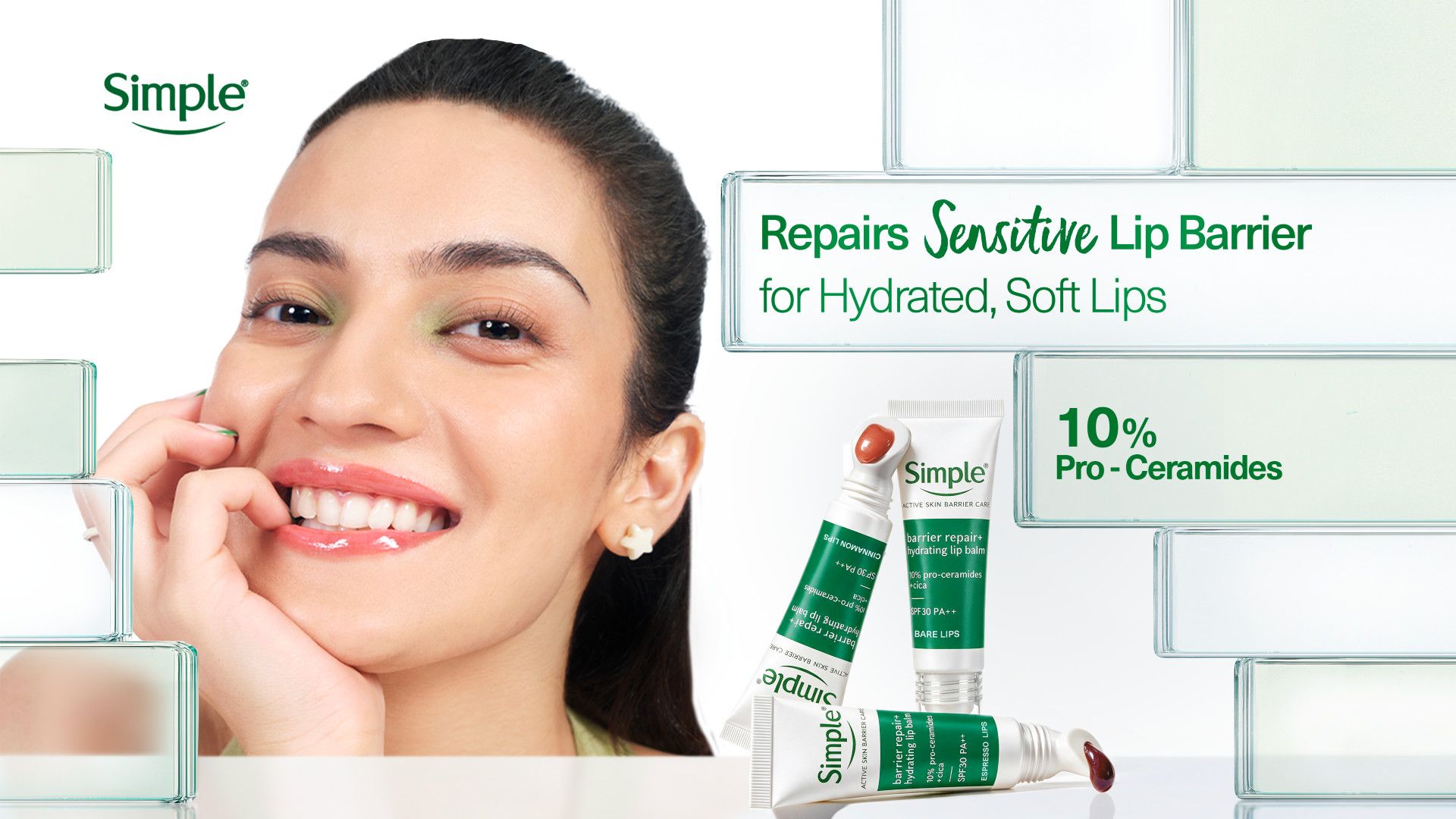 Smiling woman beside Simple lip balm tubes promoting hydrated, soft lips with 10% pro-ceramides.